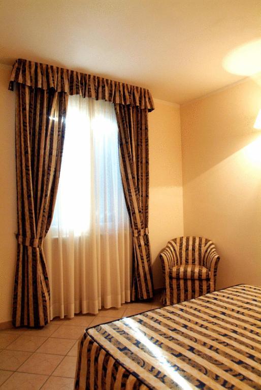 Hotel La Maddalena Quattro Castella الغرفة الصورة